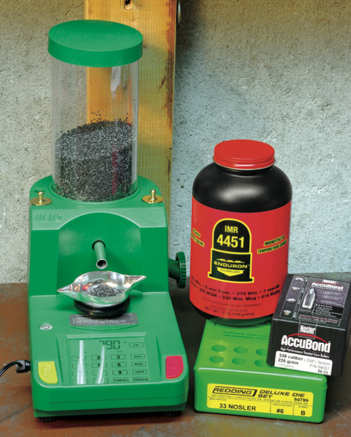 Proper powders for the 33 Nosler are on the slow end of the burn rate. Good choices include IMR 4451, IMR 8133, IMR 7977, IMR 7828SC, and H1000. The author used an RCBS Chargemaster Lite powder dispenser, which made dispensing precise powder charges easy.